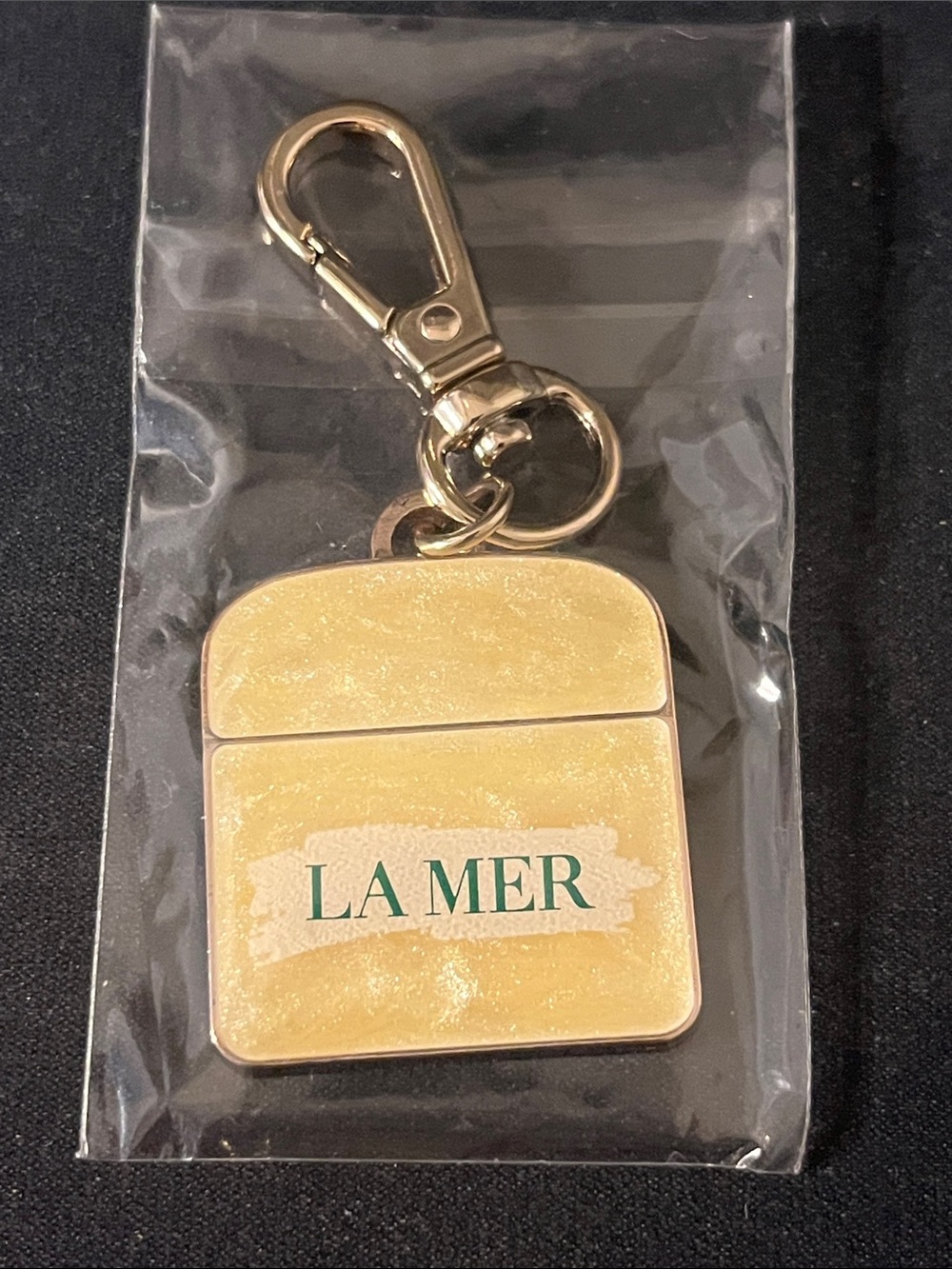 Brand New La Mer Small Pearl White Creme Holiday Ornament / Keychain/ Key Ring